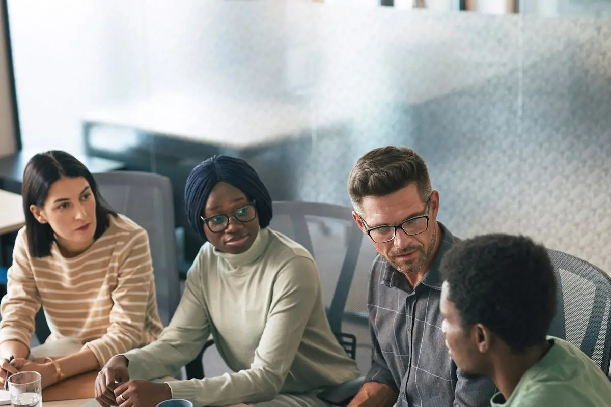 Diverse team collaborating in a modern office at Redpulse Software