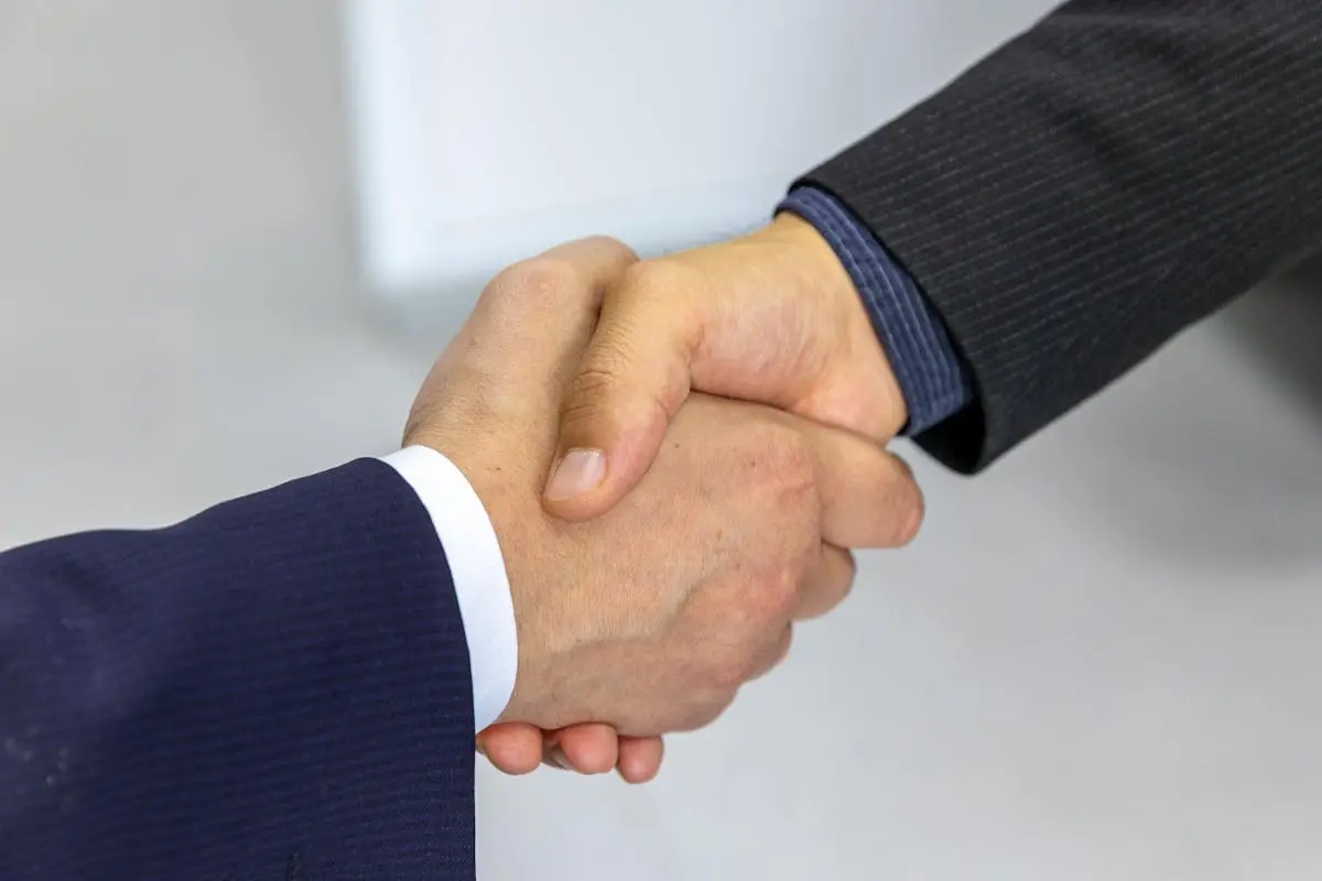 Business handshake — Get in touch with Redpulse Software in Karur, Tamil Nadu